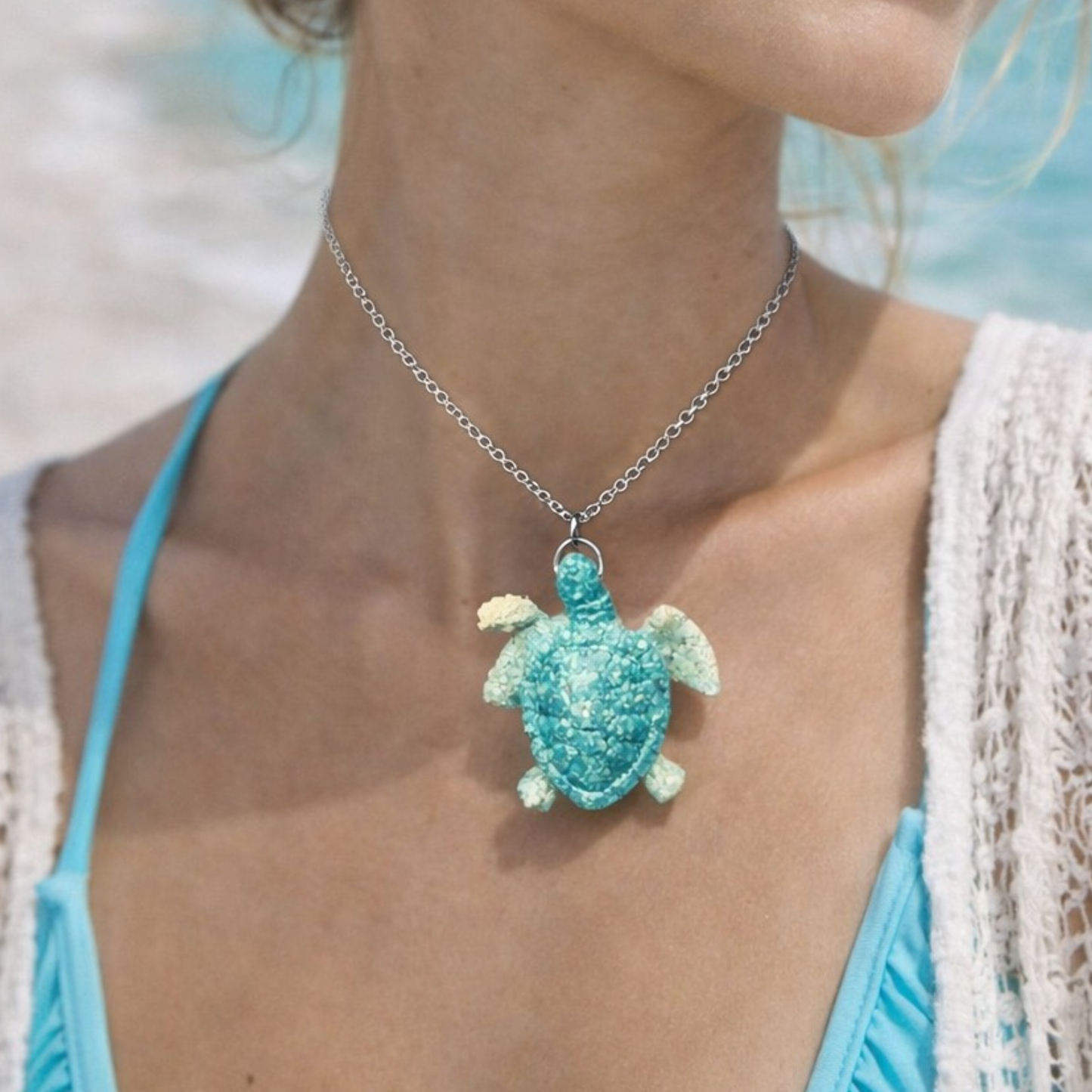 Turtle made with real beach sand, colored.